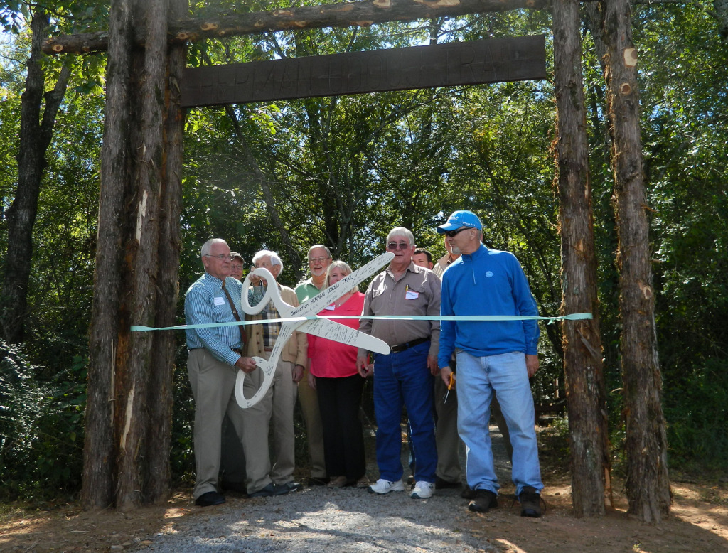 Mayor Sandy Sanders and Hardwood Tree Museum board members dedicating the Herman J. Udouj Memorial Trail